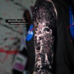 tattoo astronauta realista